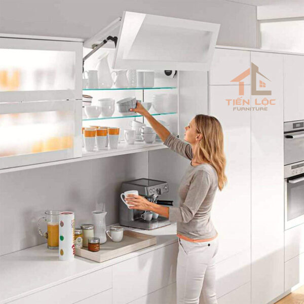tay nâng tủ bếp blum